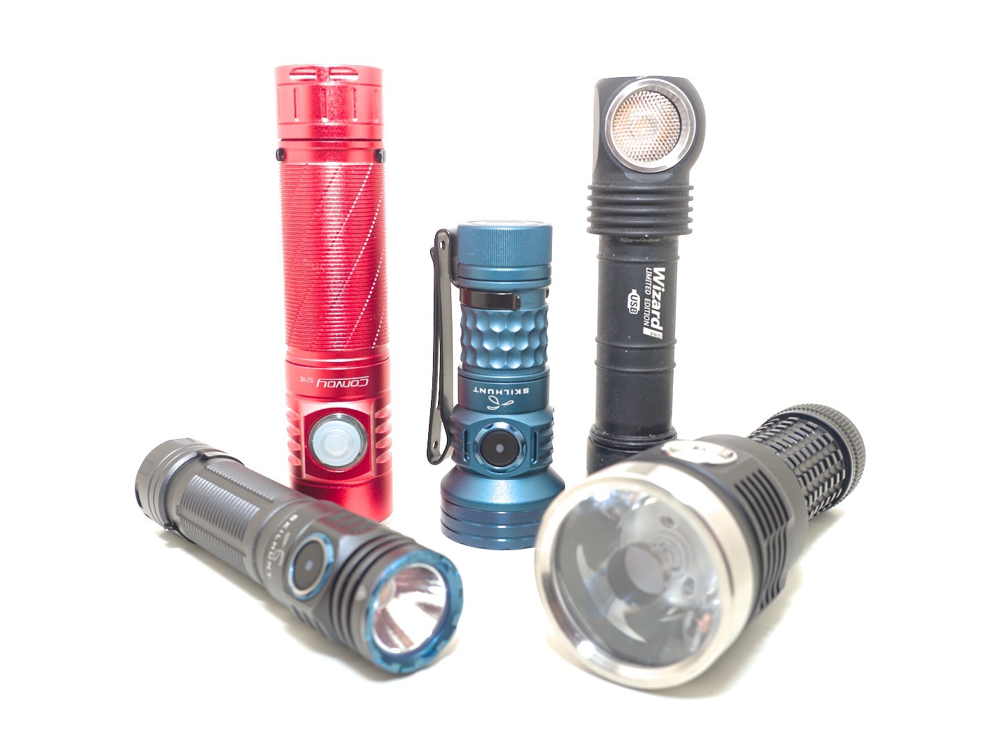 Five flashlights from various brands against a white background
