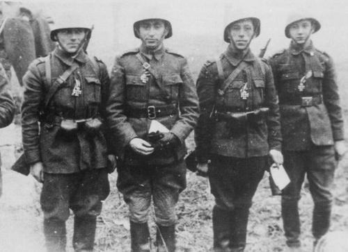 Four Romanian soldiers.