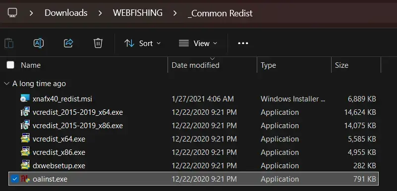 Image of my common redist folder for a downloaded game, featuring the oalinst.exe file